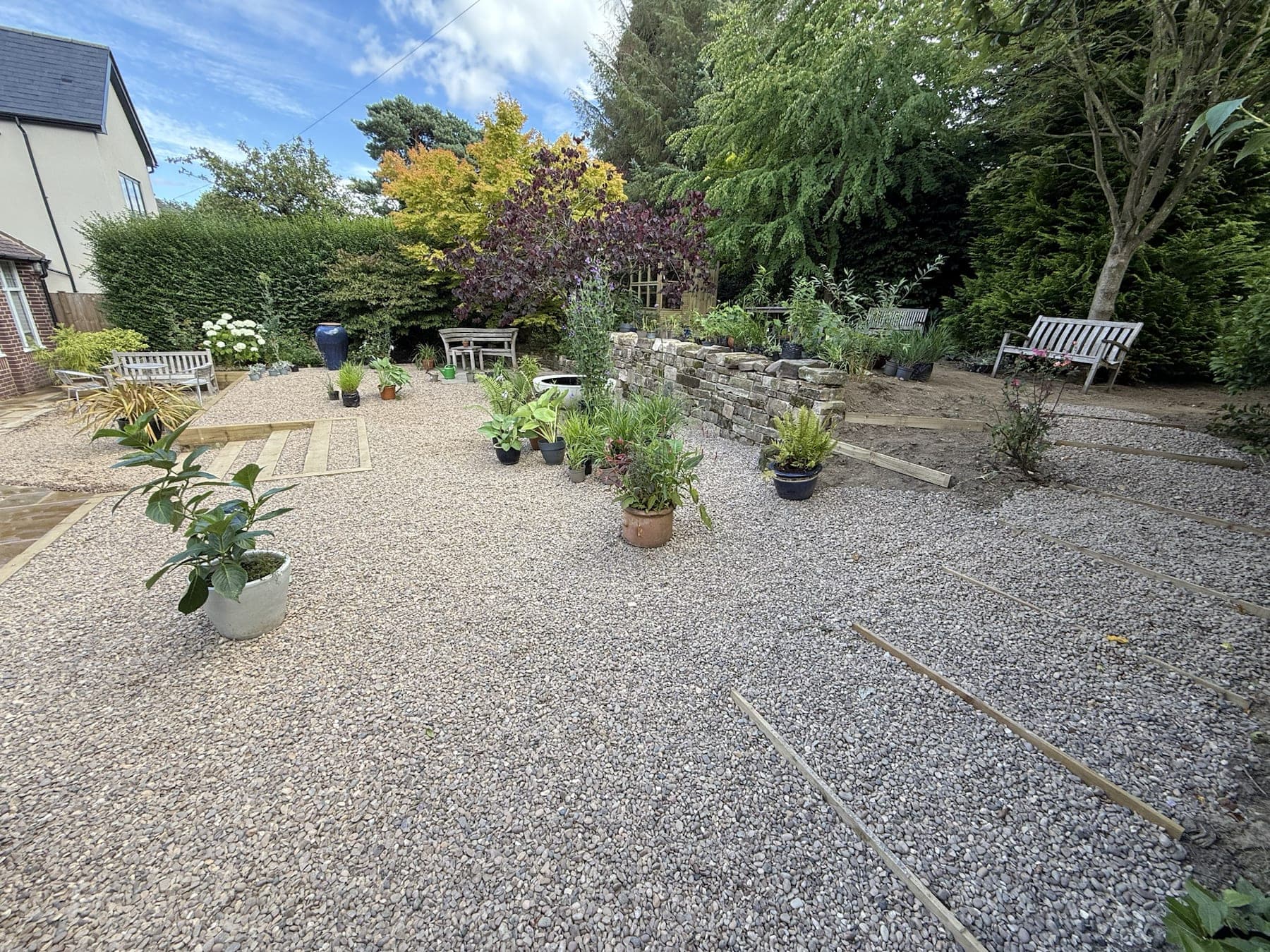 Tiered Gravel Garden & Stone Patio — image 6